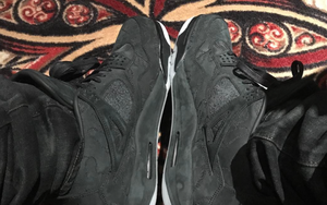 Drake上脚KAWS x Air Jordan 4