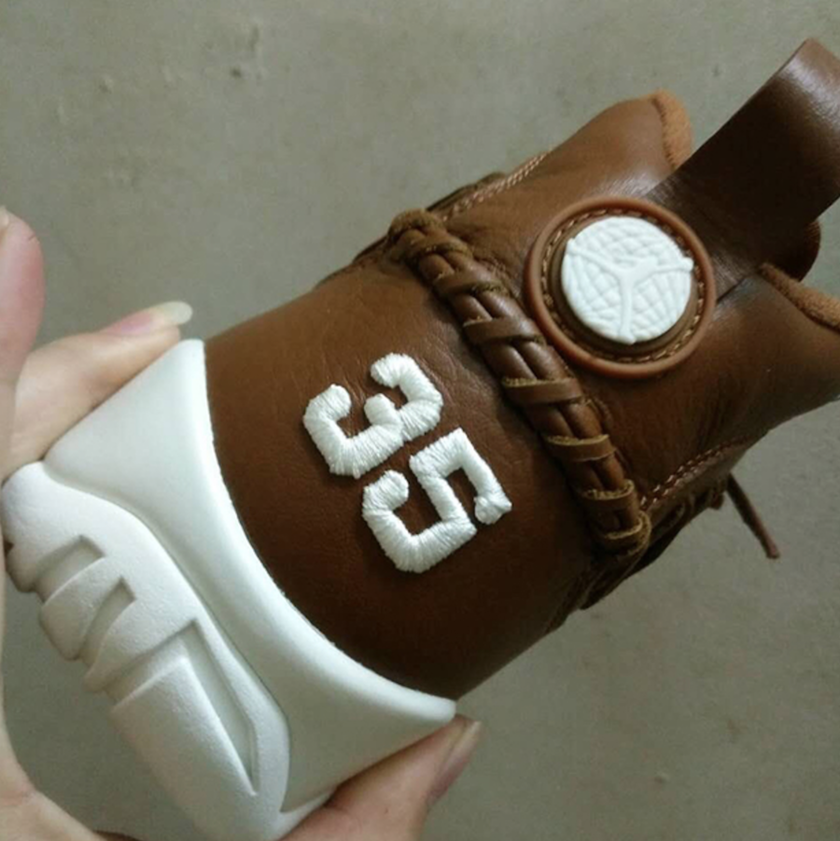 air-jordan-9-baseball-glove-brown-leather-35-heels-.png