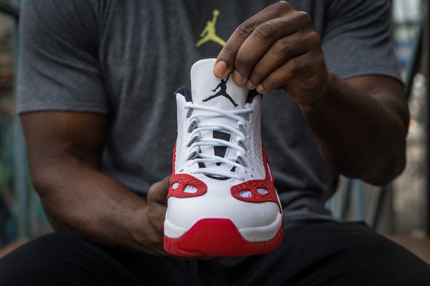 jordan-11-low-ie-gym-red-on-feet-6.jpg