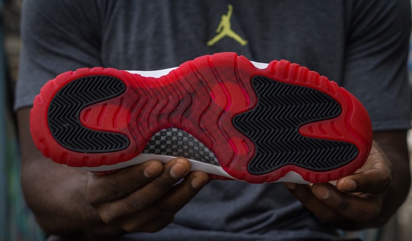 jordan-11-low-ie-gym-red-on-feet-7.jpg